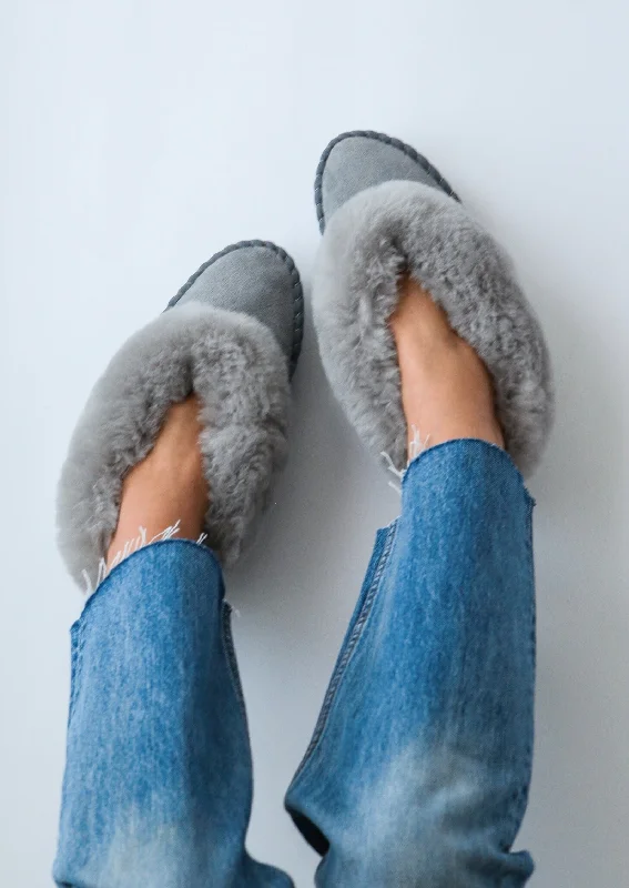 Women's Backless Slippers with a Furry Trim in Light Pink for a Cute and Casual Look Women's Sheepskin Moccasin Slippers – Soft Grey Women's Backless Slippers with a Furry Trim in Light Pink for a Cute and Casual Look Women's Sheepskin Moccasin Slippers – Soft Grey