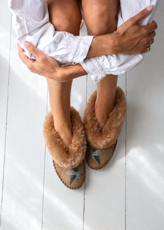 Women's Shearling Lined Slippers with a Fleece Upper in Tan for Ultimate Warmth Women's Sheepskin Moccasins Slippers – Love Birds – Blue Women's Shearling Lined Slippers with a Fleece Upper in Tan for Ultimate Warmth Women's Sheepskin Moccasins Slippers – Love Birds – Blue