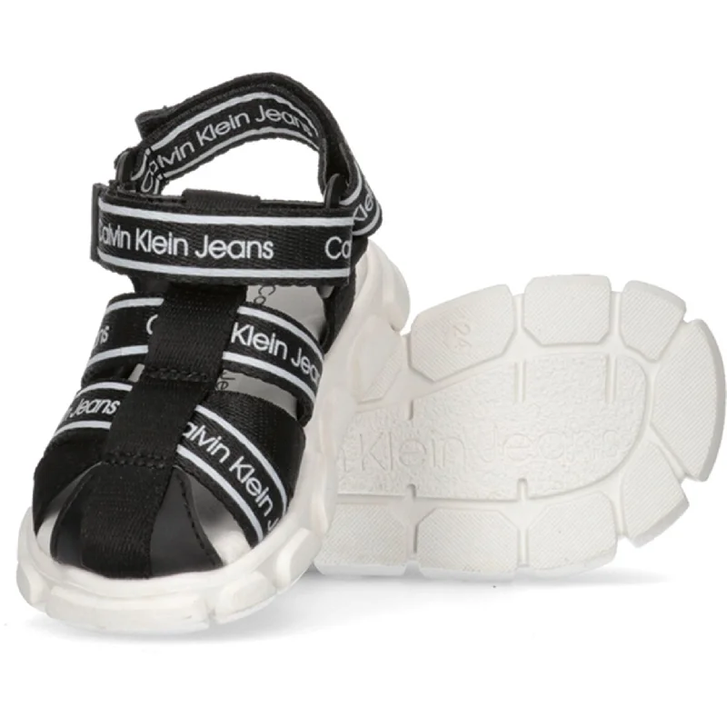 Women's Sandals with a Glitter - Coated Strap in Gold for a Sparkly Summer OutfitCalvin Klein Sandal Black Women's Sandals with a Glitter - Coated Strap in Gold for a Sparkly Summer OutfitCalvin Klein Sandal Black