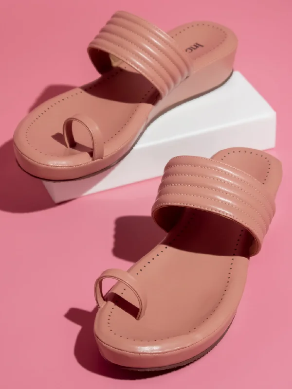 Women's Sandals with a Wedge Heel and a Tassel Detail in Orange for a Trendy LookWomen Peach Solid Comfort Sandals Women's Sandals with a Wedge Heel and a Tassel Detail in Orange for a Trendy LookWomen Peach Solid Comfort Sandals